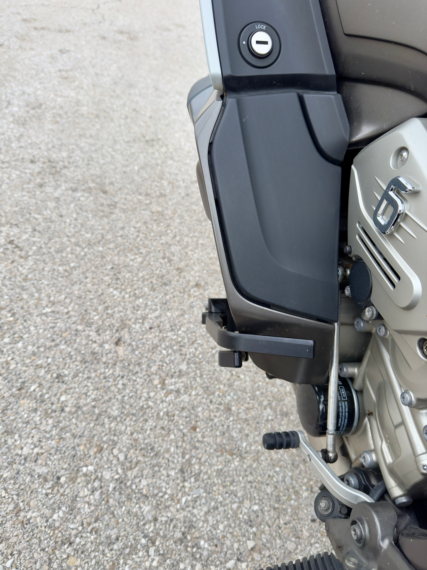 Sleek highway pegs footrest for BMW K1600 – modern design for BMW GT enthusiasts.