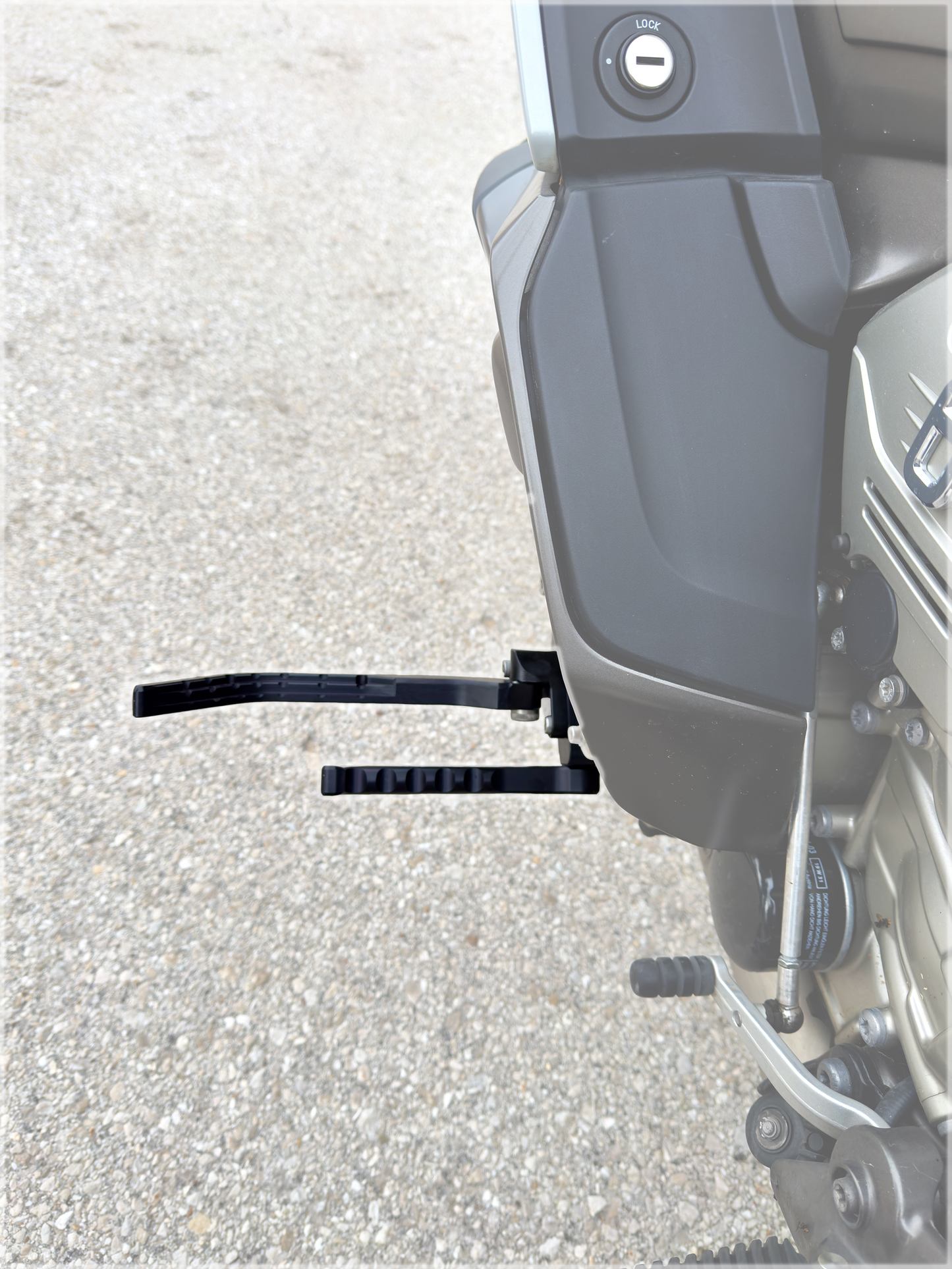 Durable footrest accessory with highway pegs for BMW K1600GTL – built for comfort and style.