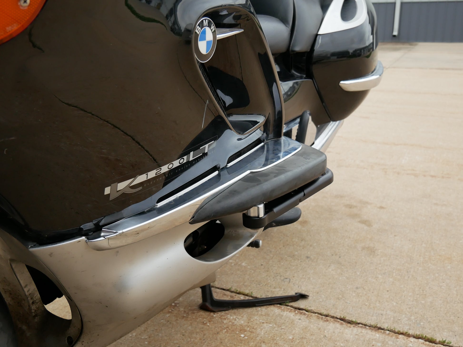 Sleek BMW motorcycle highway pegs. BMW K1200LT highway peg foot rest.