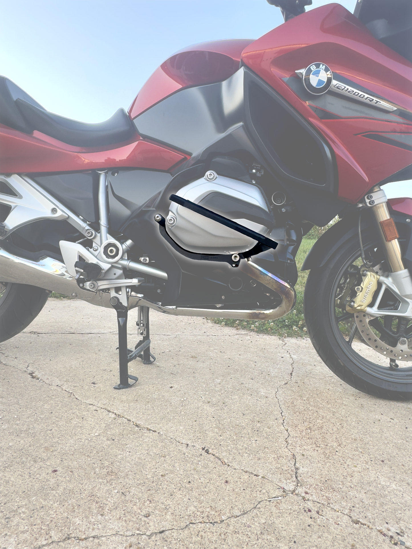 Custom Gemini 1200 highway pegs and foot rest accessory for BMW R1200, R1200GS, RT, R, and RS models.