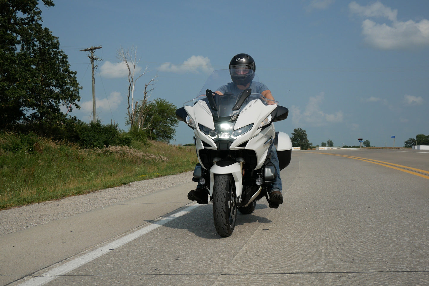 Sleek and comfortable BMW motorcycle highway pegs. BMW R1250 RT highway peg foot rest.