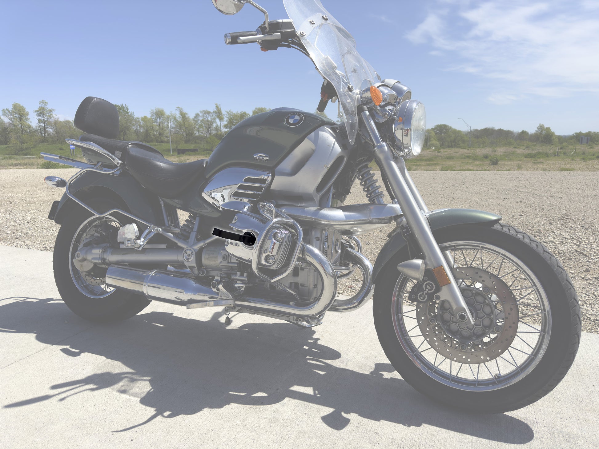 Discreet Rizoo highway pegs and footrests for BMW R1200C and R1200CL – durable, USA-made accessory for improved riding stability.