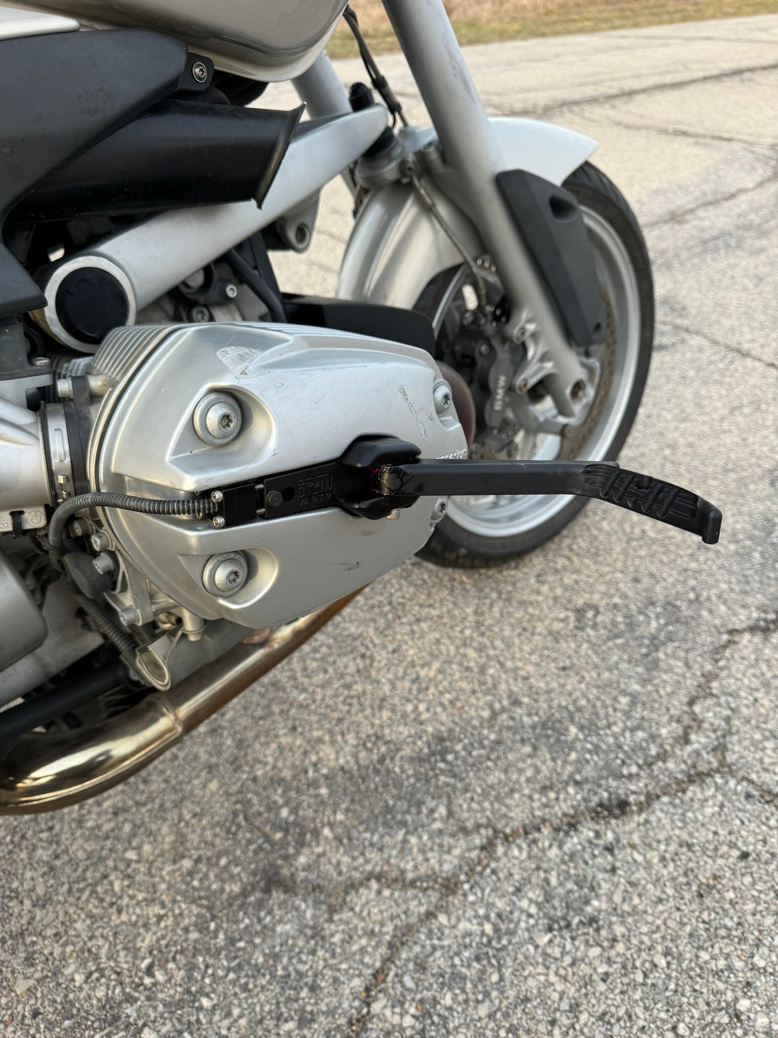 Sleek BMW motorcycle highway pegs. BMW R1200 RT highway peg foot rest. 